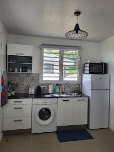 Köök või kööginurk majutusasutuses les tiny houses d'akapa