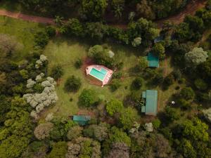 an aerial view of a house in the forest at Posada Camboatá in Aristóbulo del Valle