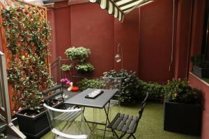 Vonkajšia záhrada v ubytovaní Hotel Lancaster