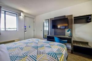Postel nebo postele na pokoji v ubytování Motel 6-Jackson, MS