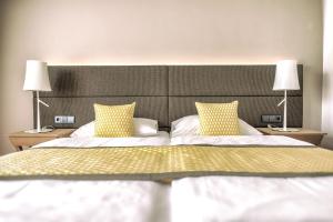 Postel nebo postele na pokoji v ubytování Hotel Turmhof