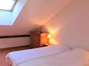 a bedroom with a bed and a dresser and a window at Appartement Vars, 5 pièces, 10 personnes - FR-1-330B-139 in Vars