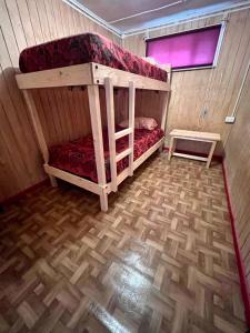 Postel nebo postele na pokoji v ubytování Isla yu Patagonia house