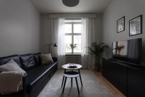 Uma área de estar em Kodikas huoneisto Helsingin keskustassa