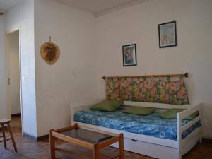 En eller flere senger på et rom på Appartement Saint-Cyprien, 1 pièce, 4 personnes - FR-1-225D-2