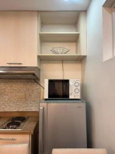 Η κουζίνα ή μικρή κουζίνα στο Sm uptown 1 bedroom condo primamera residence cagayan de oro city +7 φωτογραφίες