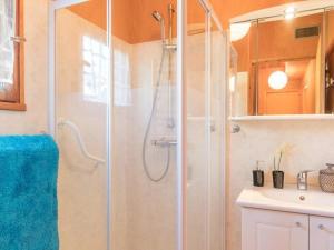 a bathroom with a shower and a sink at Chalet Puy Saint Vincent 1400, 5 pièces, 8 personnes - FR-1-330G-60 in Les Prés