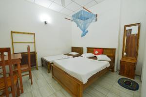 Postel nebo postele na pokoji v ubytování Venus Resorts
