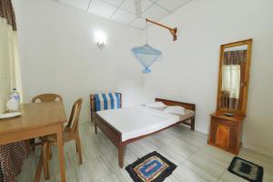 Postel nebo postele na pokoji v ubytování Venus Resorts