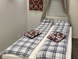 Postel nebo postele na pokoji v ubytování Holiday home Korssund II
