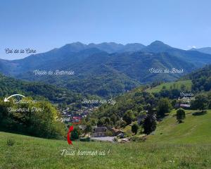 a view of a valley with mountains in the distance at Chambres d'hôtes Les Chatougoulis in Les Bordes-sur-Lez