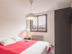 Katil atau katil-katil dalam bilik di Appartement 2 pièces avec parking à 150m des télécabines - FR-1-330F-31