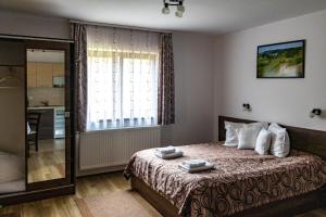 Casa Tofi Vendégház客房内的一张或多张床位