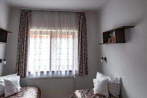 Casa Tofi Vendégház客房内的一张或多张床位