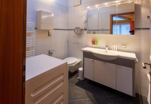 Koupelna v ubytování Haus Malva by Zermatt Premium Apartments