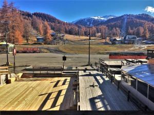a skate park with benches and mountains in the background at Appartement Risoul, 1 pièce, 4 personnes - FR-1-330-156 in Risoul