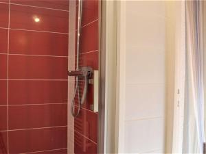 a shower with a shower head in a bathroom at Appartement 2 pièces cabine - 6 couchages - Risoul 1850 - FR-1-330-152 in Risoul +16 photos