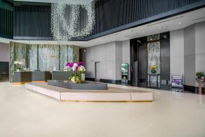 Area soggiorno di Le Sands Oceanfront Danang Hotel