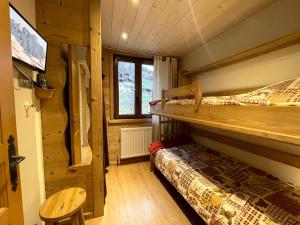 Katil atau katil-katil dalam bilik di Gentianes 3 - Appartement centre village et proche pistes de skis