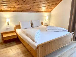 Postel nebo postele na pokoji v ubytování Haus Seerose