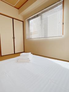 Katil atau katil-katil dalam bilik di PINE TREE HOTEL