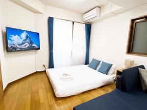 Katil atau katil-katil dalam bilik di PINE TREE HOTEL