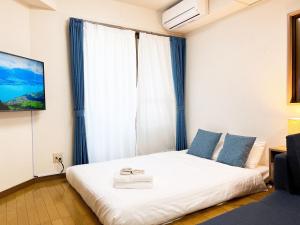 Katil atau katil-katil dalam bilik di PINE TREE HOTEL