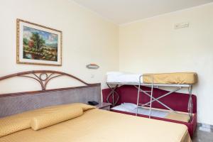 Postel nebo postele na pokoji v ubytování Park Hotel Valle Clavia + 37 fotografií