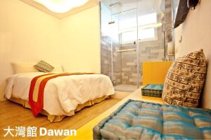 Postel nebo postele na pokoji v ubytování Kenting Dawan Homestay