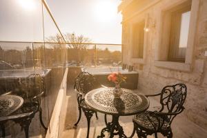A balcony or terrace at Cappadocia Pegasos Cave Suite Hotel