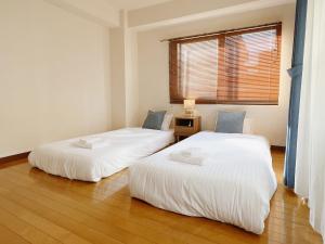 Katil atau katil-katil dalam bilik di PINE TREE HOTEL