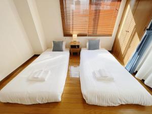 Katil atau katil-katil dalam bilik di PINE TREE HOTEL