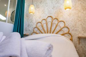 Posteľ alebo postele v izbe v ubytovaní Saint-Gilles-Croix-de-Vie, Charmant appartement 4pers 'O MERCADO'