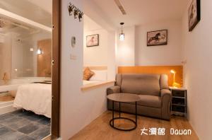 Postel nebo postele na pokoji v ubytování Kenting Dawan Homestay