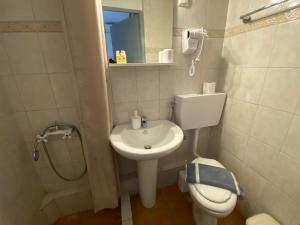 Ванная комната в Sunset view Rooms