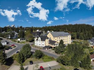 an aerial view of a town with a building at Schlossberghotel Oberhof in Oberhof