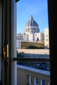 a view of a building from a window at Vaticano Al Piano Nobile in Rome