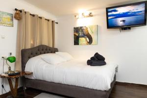 Postel nebo postele na pokoji v ubytování Bubas place