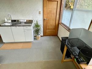 Kuchyň nebo kuchyňský kout v ubytování Refre Inn Fukuzawa