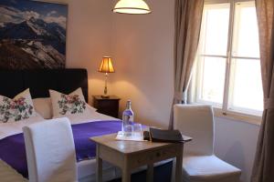 Postel nebo postele na pokoji v ubytování Hotel Schlosswirt