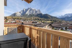 a balcony with a view of a mountain at Zugspitz Residence Ehrwald in Ehrwald