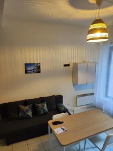 Kuchyňa alebo kuchynka v ubytovaní Appartement Cosy en centre centre-ville . . .