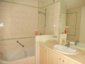 a bathroom with a sink and a tub and a shower at Appartement Antibes, 2 pièces, 4 personnes - FR-1-252-30 in Antibes