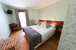 Postel nebo postele na pokoji v ubytování HOTEL SPORTING