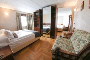 Postel nebo postele na pokoji v ubytování HOTEL SPORTING