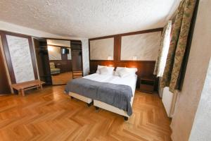 Postel nebo postele na pokoji v ubytování HOTEL SPORTING