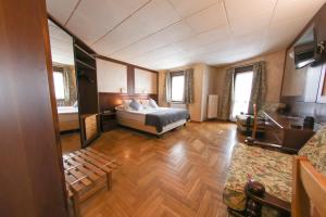 Postel nebo postele na pokoji v ubytování HOTEL SPORTING