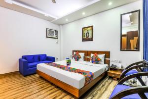Postel nebo postele na pokoji v ubytování FabHotel The Residency DLF Galleria + 16 fotografií