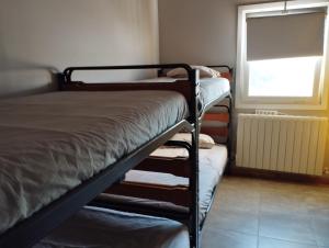 Postel nebo postele na pokoji v ubytování Alarpe Aterpetxea BSS00035