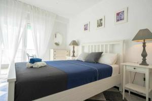 Posteľ alebo postele v izbe v ubytovaní Apartamento Gallo Rojo